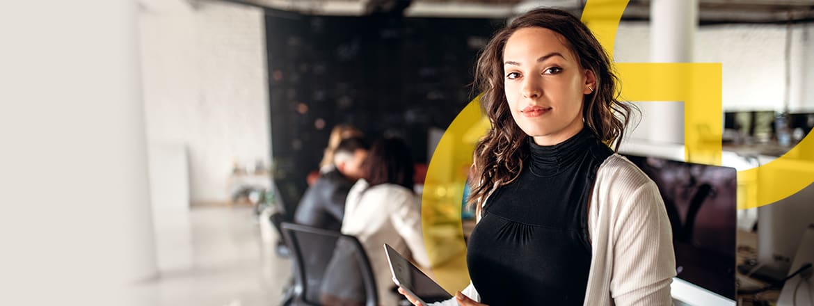 Featured image for article titled "How Should CEOs Approach Cyber Resilience?" showing a woman holding a tablet with a people behind sitting at a table and the Elev8 logo in yellow.