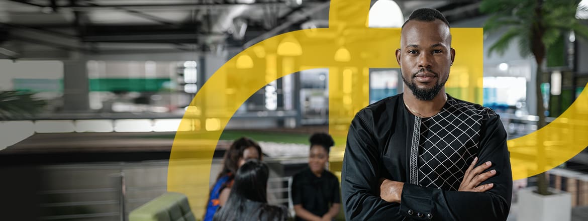 Featured image for article titled "How Advancements in Technology Have Impacted Leadership" showing a man standing in front of his team with Elev8's logo behind.