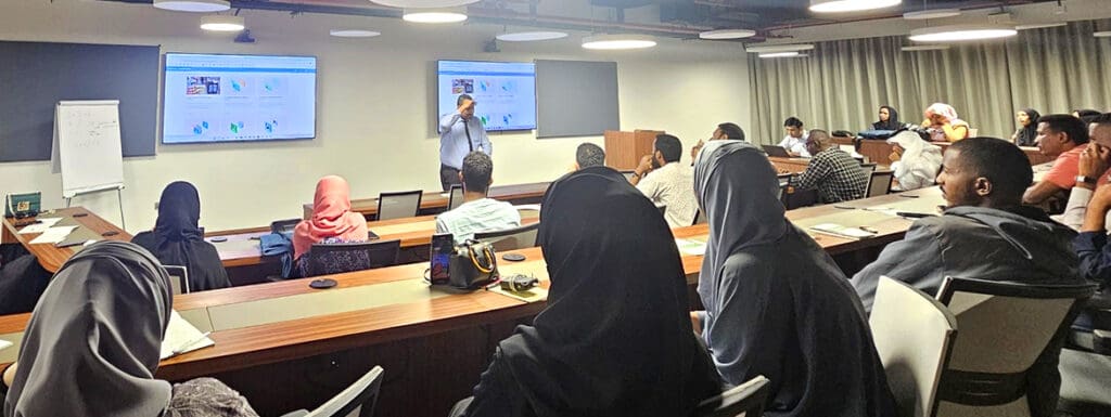 Featured image for article titled "Elev8's Digital Center of Excellence Hosts Qatar University’s AI Training" showing a group of learners at Elev8's Digital Center of Excellence during the AI Training.